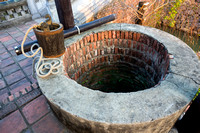 Old Well and Water Bucket